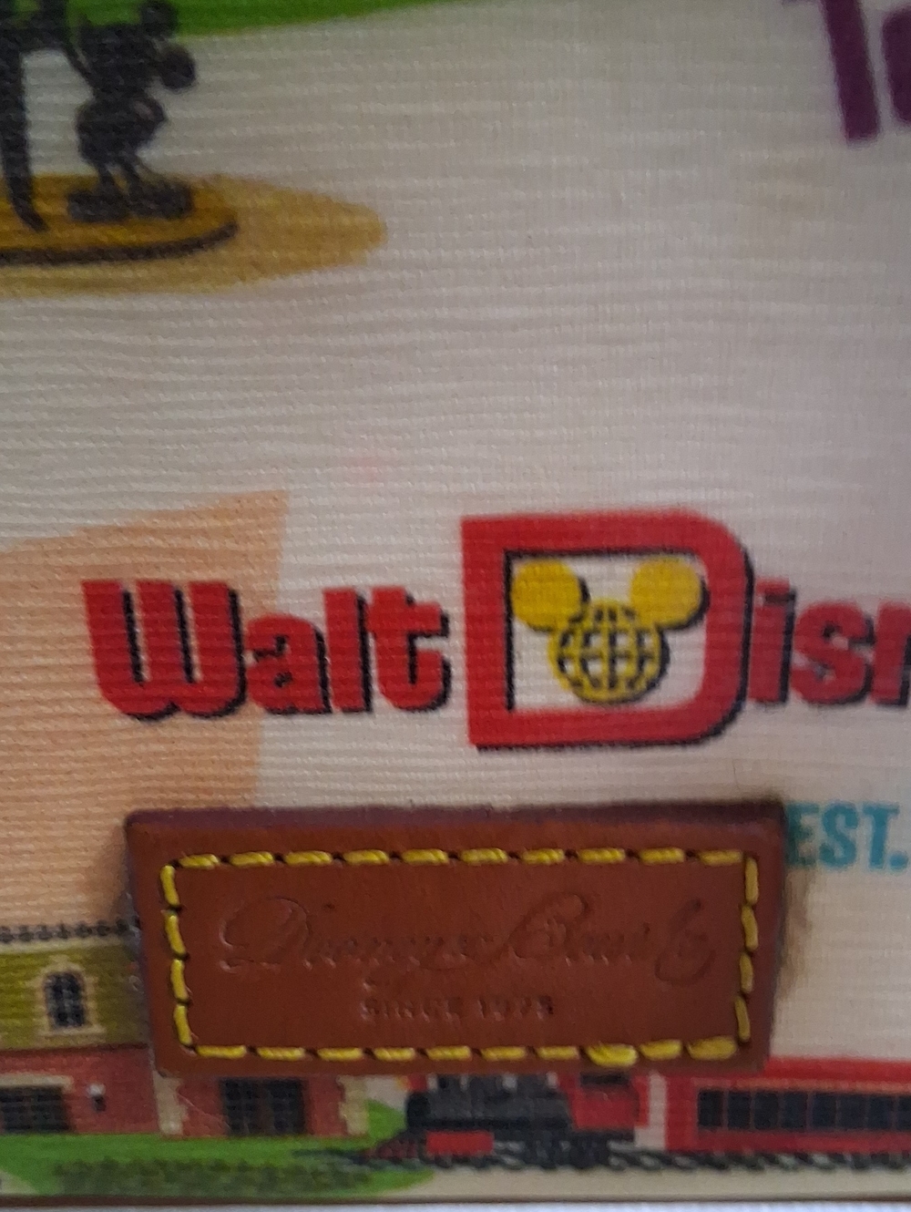 Dooney/Disney Cream & Brown Wristlet ,Hard To Find Like New - Picture 6 of 7